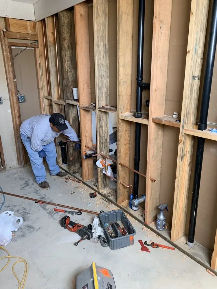 Commercial rough-in plumbing for Water Heater Replacement in Calvert Hills Historic District